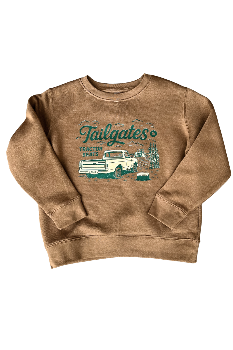 product photo of a kids crewneck sweatshirt in camel brown with a vintage gold truck and green text that says tailgates and tractor seats above a corn field with a tractor in it.