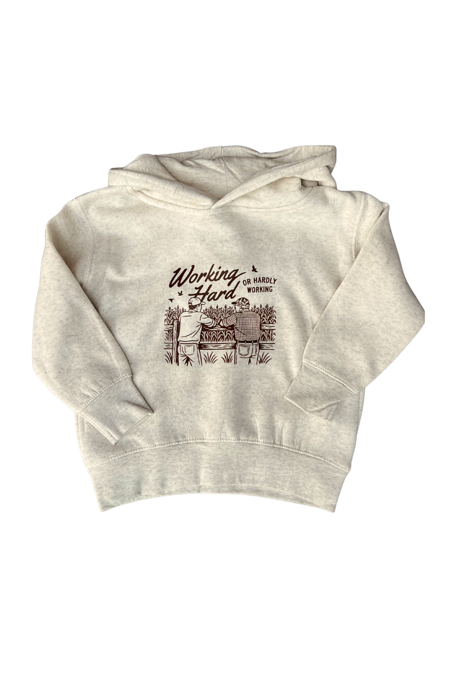 oatmeal toddler hoodie with graphic of 2 farmers leaning up against a fence talking looking out over a cornfield with the works working hard or hardly working in brown