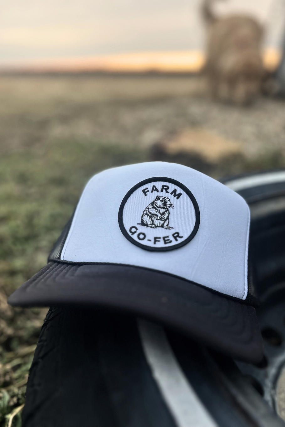 foam trucker hat with &quot;farm Go-fer &quot;patch in black and white