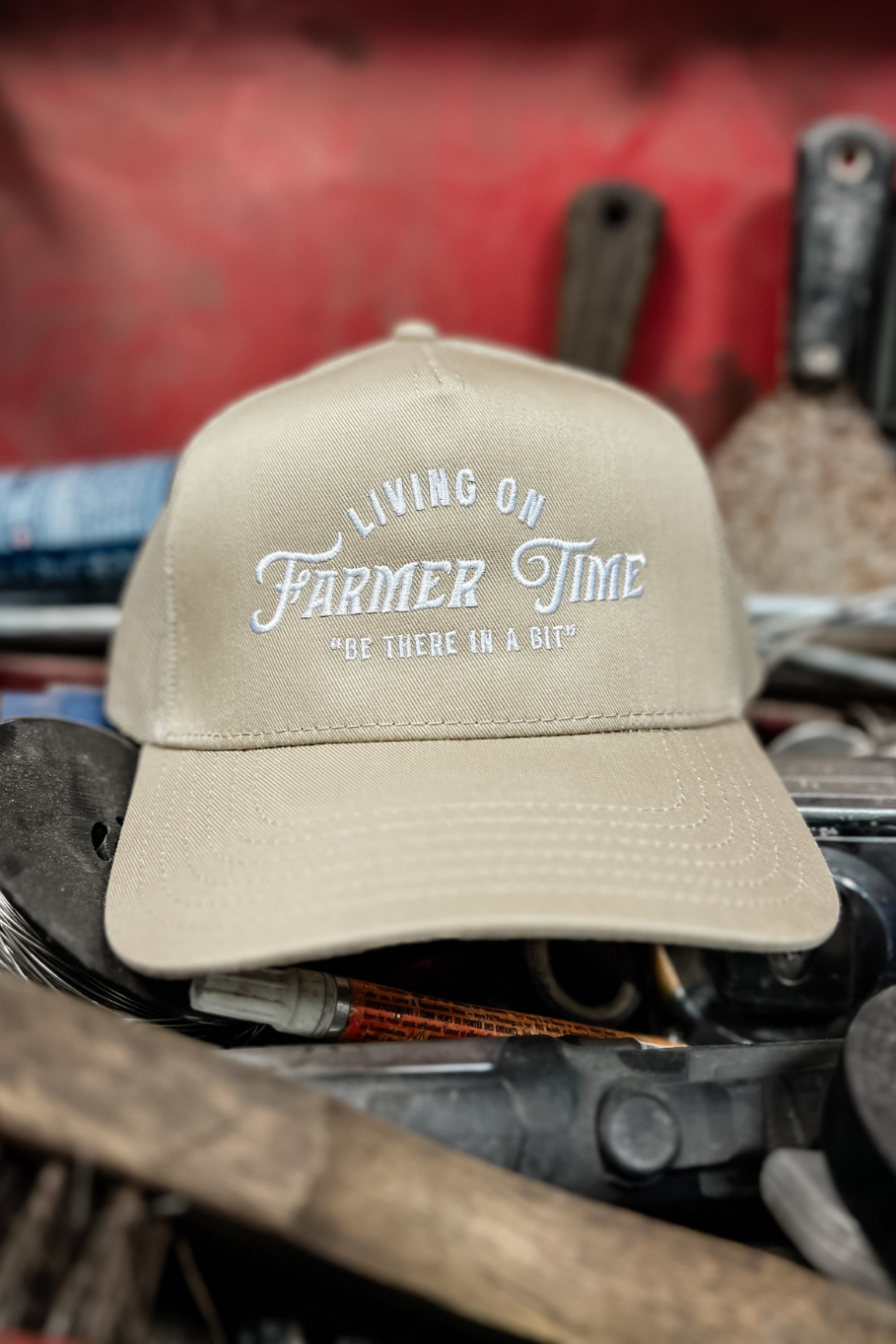 Living On Farmer Time Trucker Hat in Tan