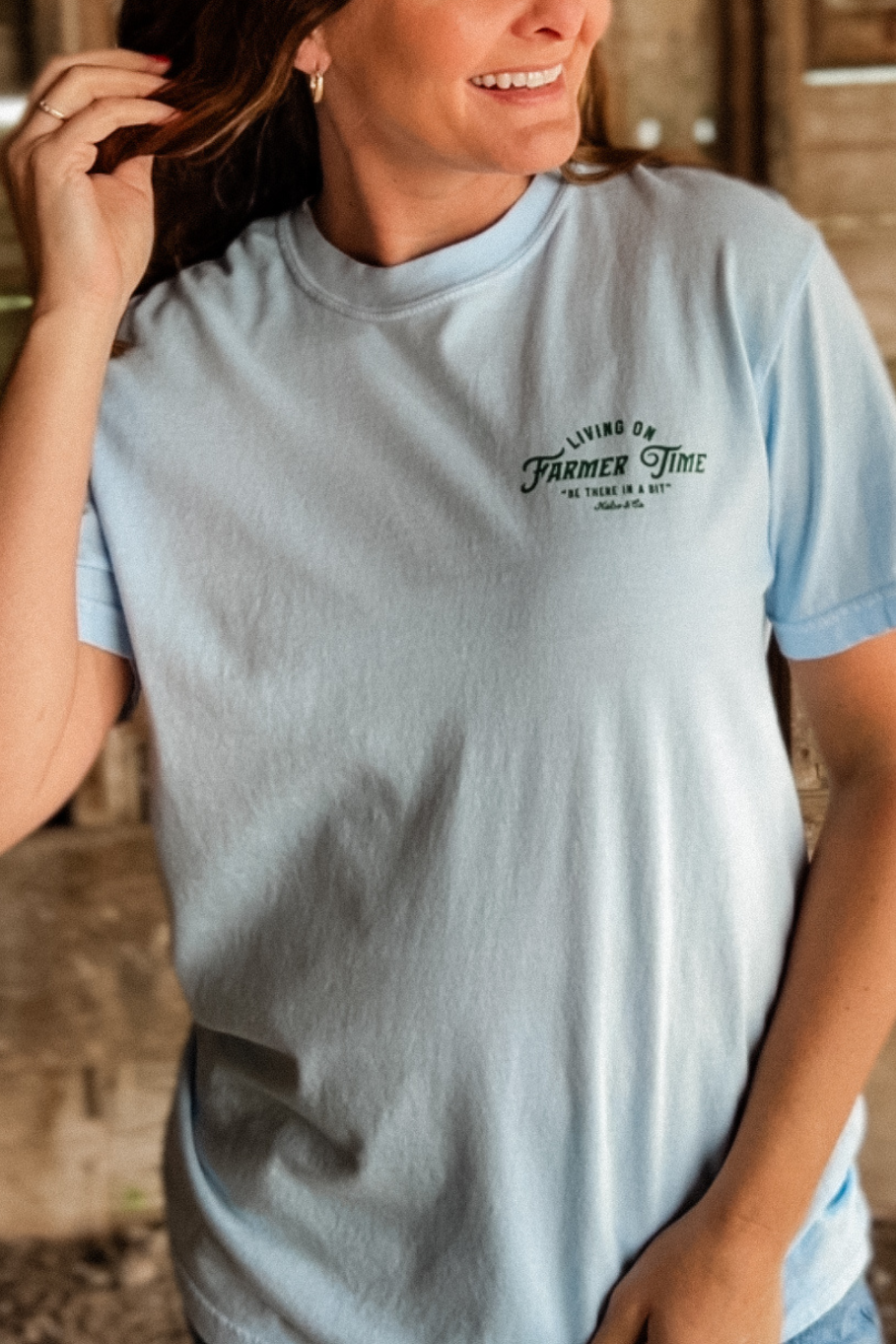 Living On Farmer Time Graphic Tee in Light Blue
