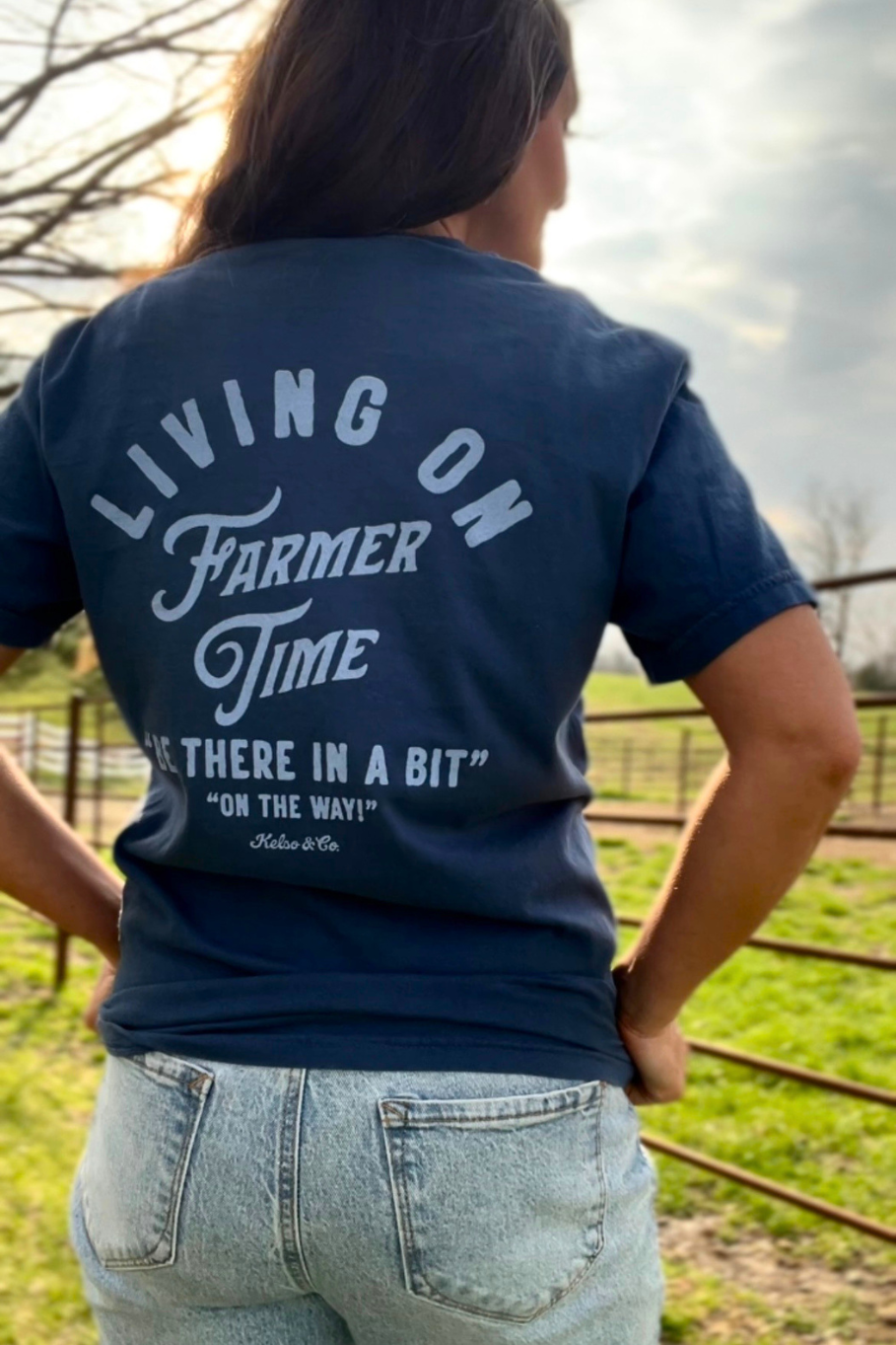 Living on farmer time unisex t shirt. Midnight blue shirt with light blue lettering. 