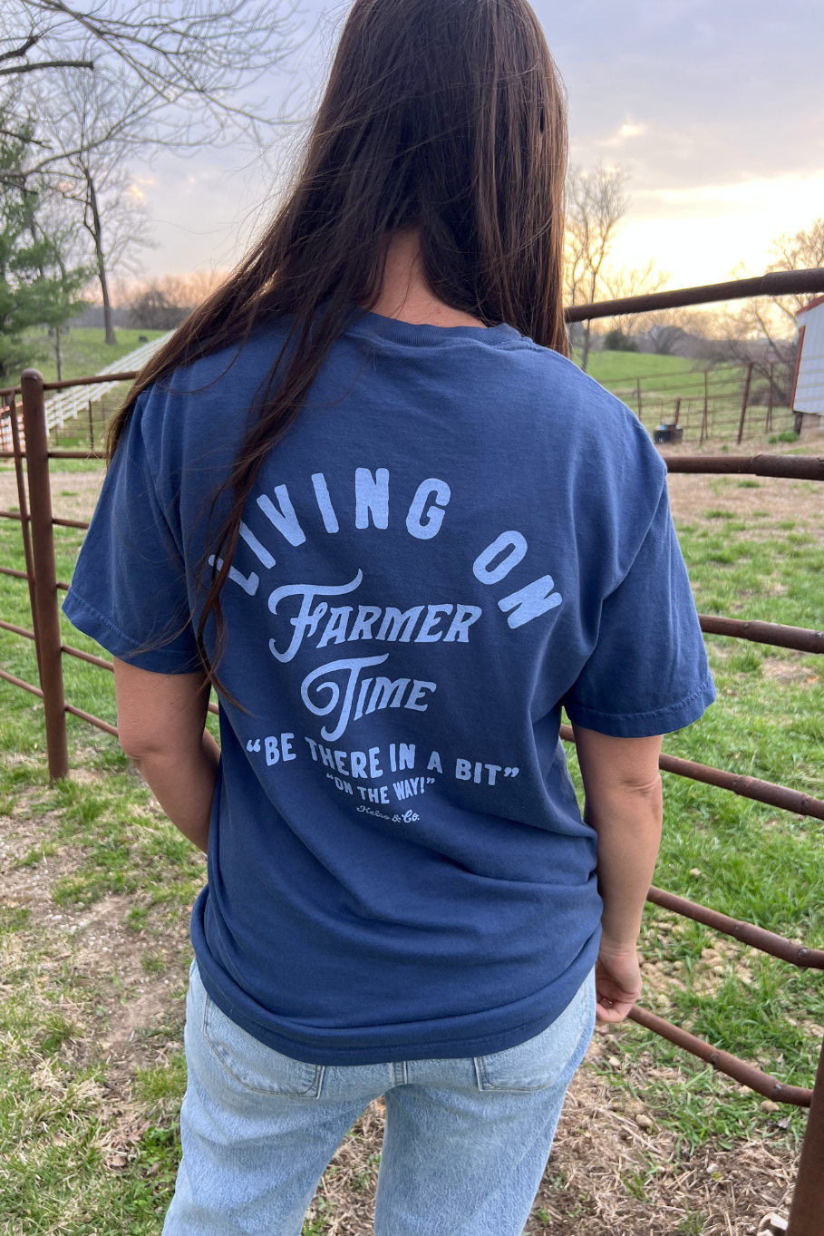 Living on farmer time unisex t shirt. Midnight blue shirt with light blue lettering. 