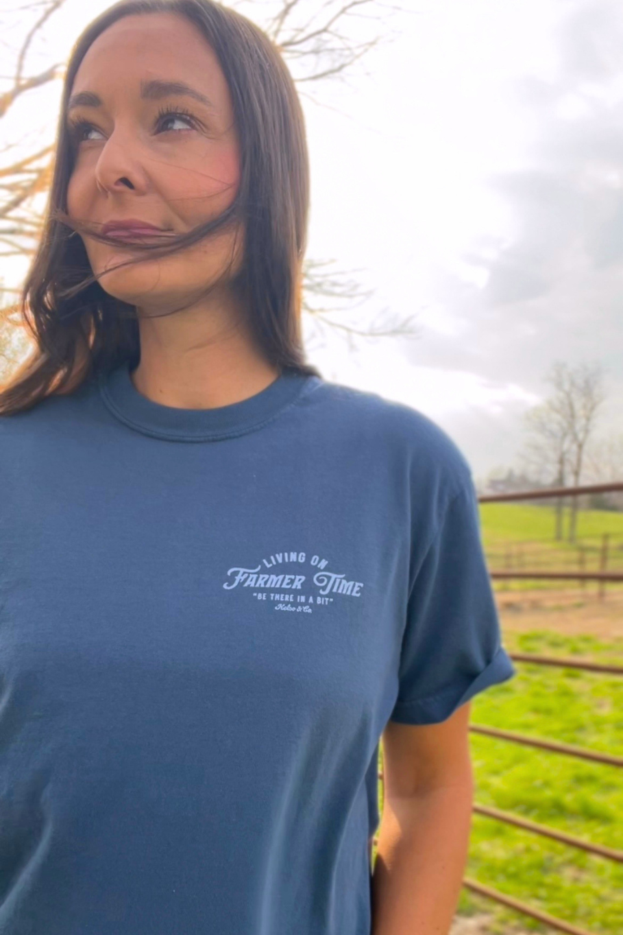 Living on farmer time unisex t shirt. Midnight blue shirt with light blue lettering. 