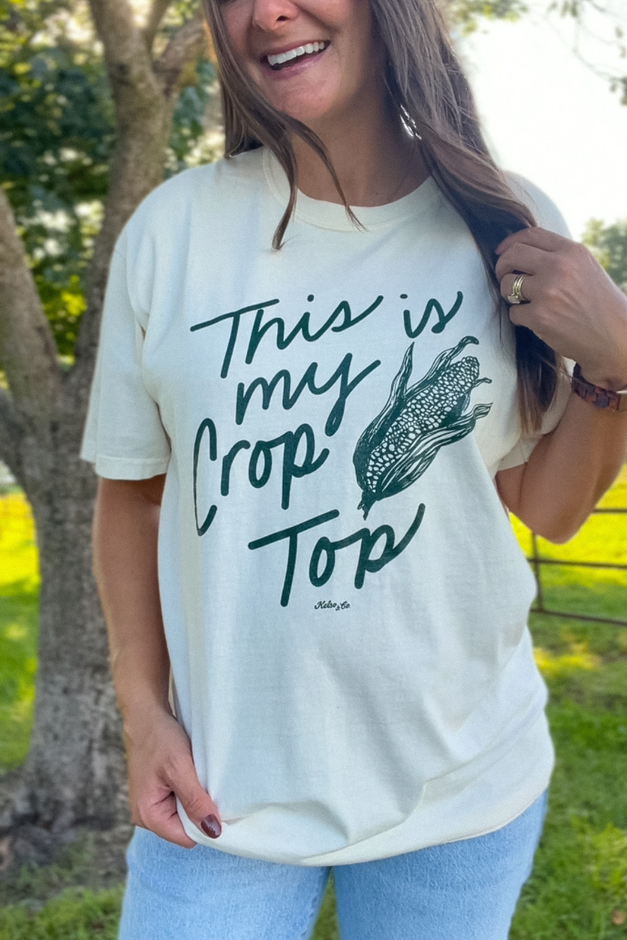 ivory comofort colors tee with handwritten this is my crop top graphic with ear of corn