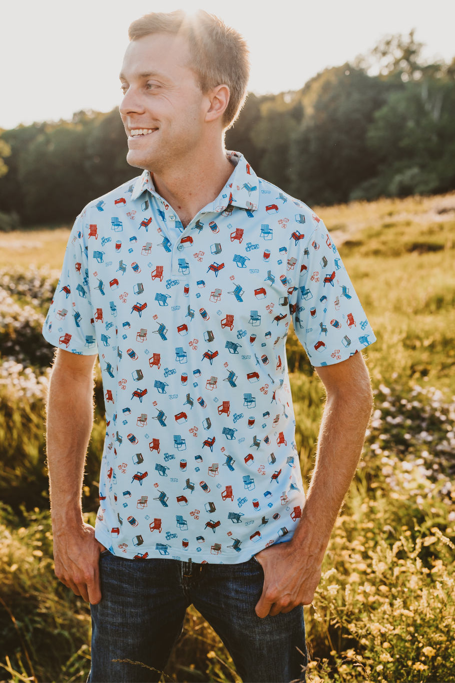 pattern of vintage lawn chairs, coolers, ice and a lager on a men's performance polo in light blue