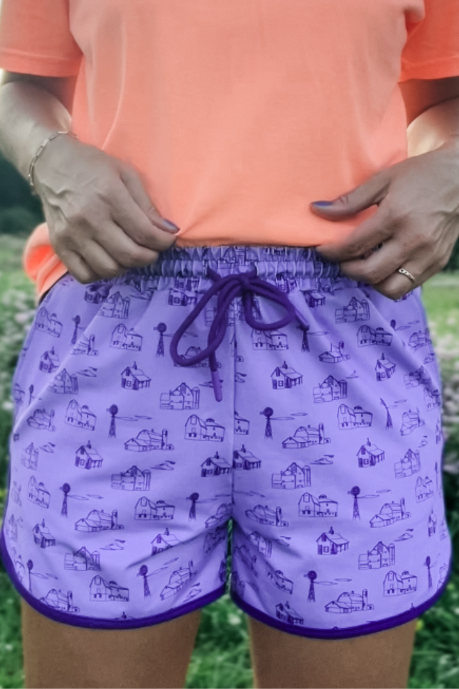 Women&#39;s retro farm shorts featuring purple monochromatic print with barns and windmills