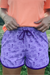 Women's retro farm shorts featuring purple monochromatic print with barns and windmills