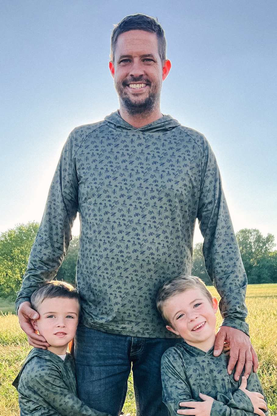 father and two sons wearing the diesel drip performance hoodies