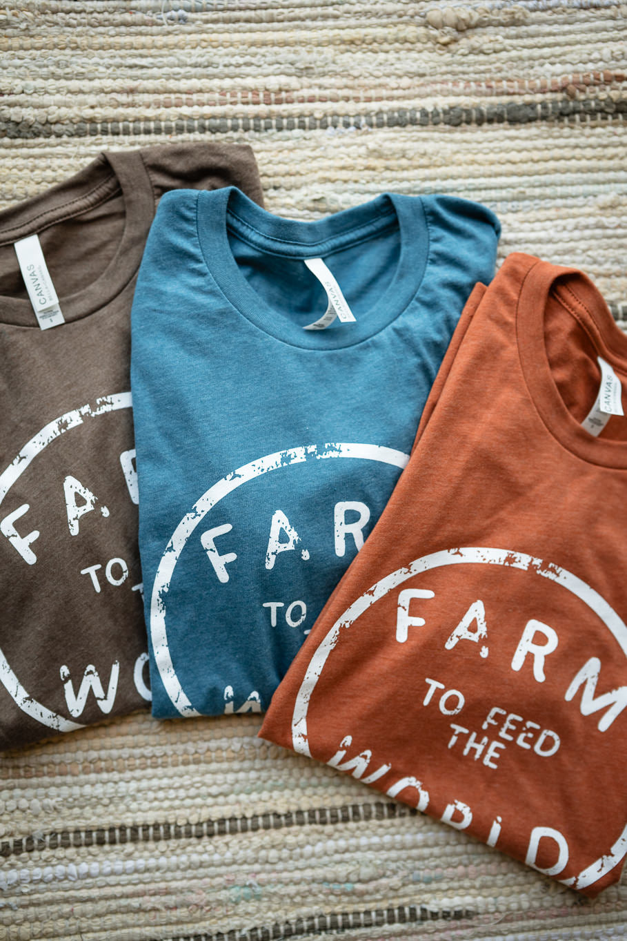 Feed the World Graphic Tee in Heather Brown | Sizes S - 3XL - Rosebud's Tees