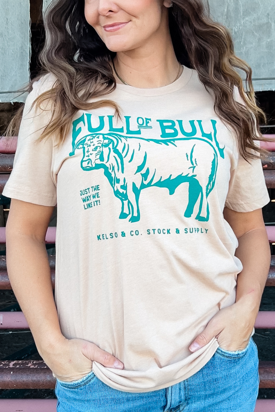 woman wearing a tshirt with a bull on it that says "Full of Bull Kelso & Co Stock & Supply"
