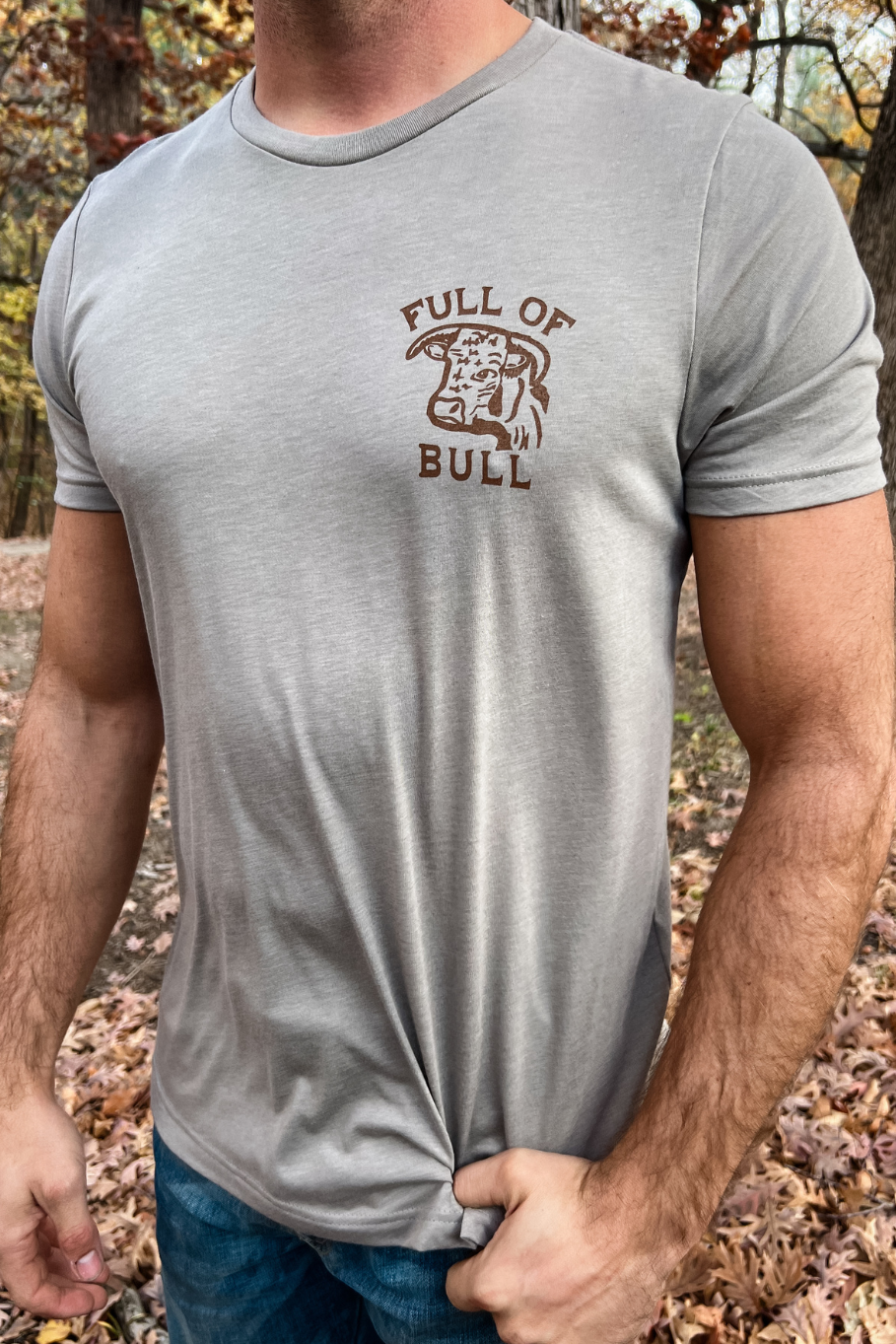 guy wearing a tshirt that says full of bull printed on the left chest with the graphic of a vintage bull head