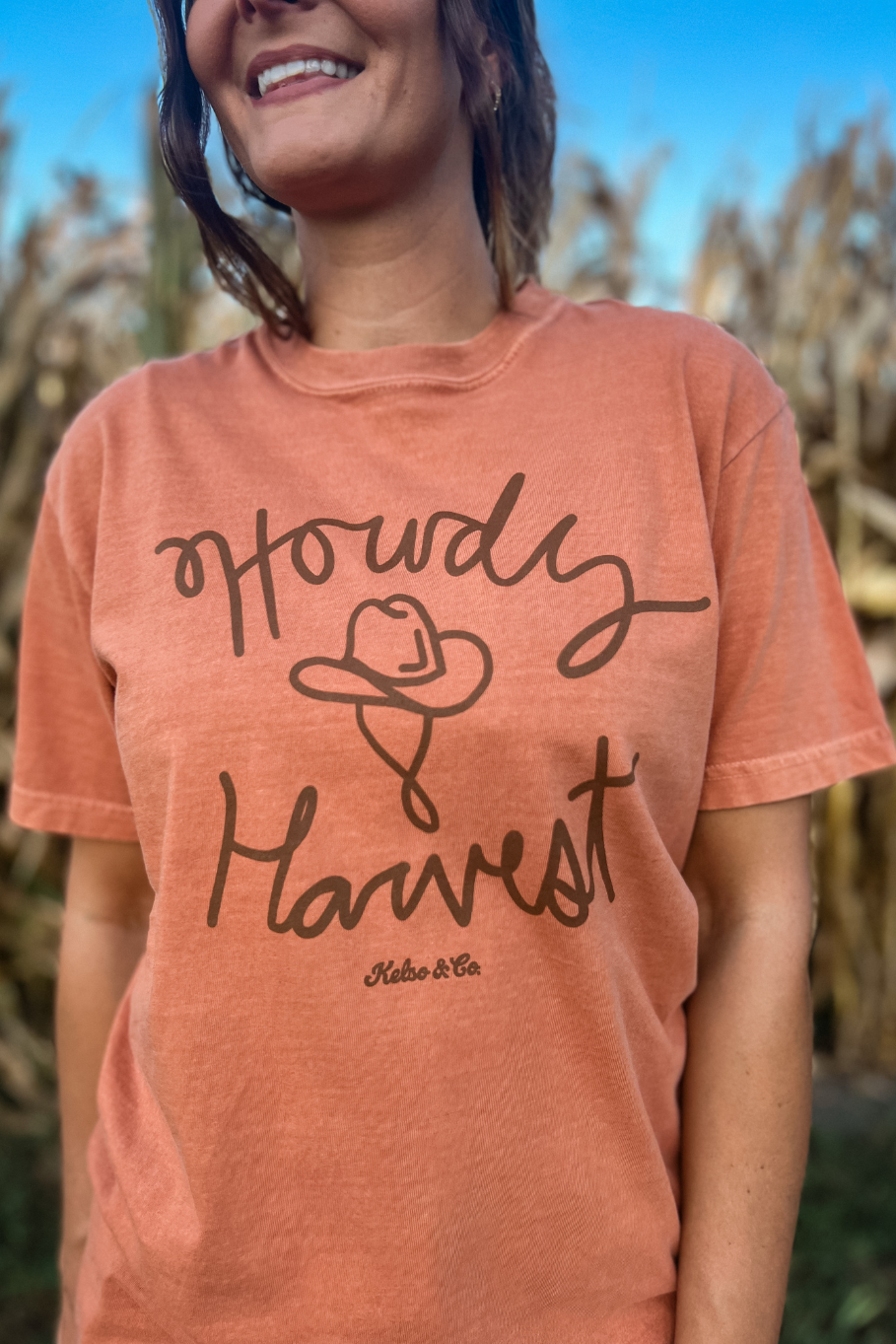 hand drawn cowboy hat with howdy harvest text graphic tee