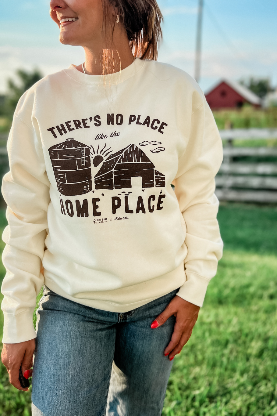no place like the home place graphic sweatshirt with a grain bin, sunset, and barn
