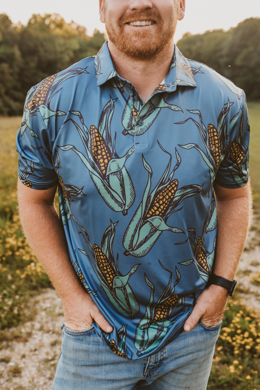 men's corn polo shirt in blue with large ears of corn