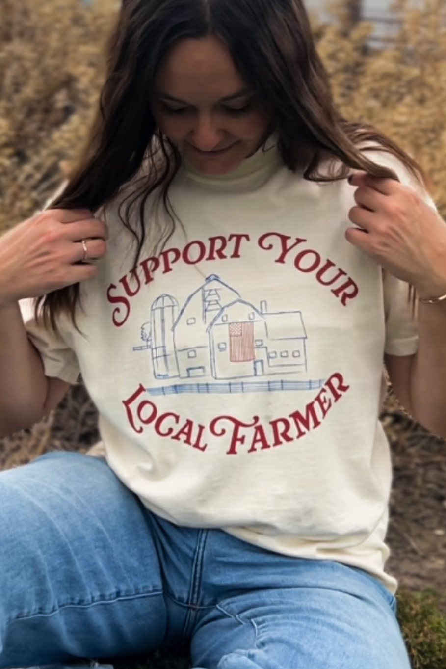 blue hand drawn barn with red american flag. Support your local farmer