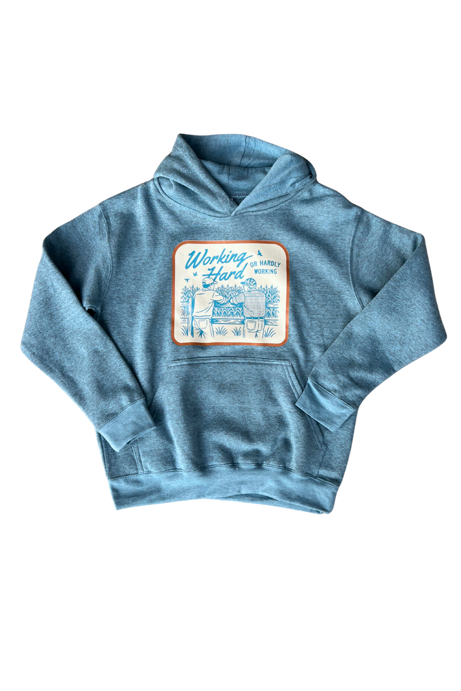 Blue youth farm hoodie with vintage farmer graphic and the phrase “working hard or hardly working,” laid flat for product display